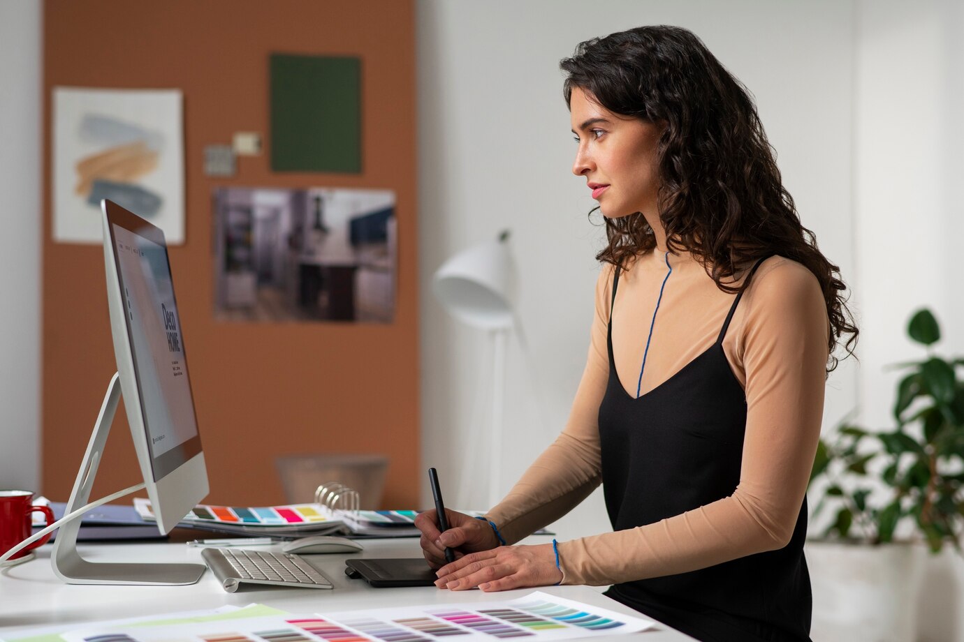 TechUp engineer monitoring application performance on laptop