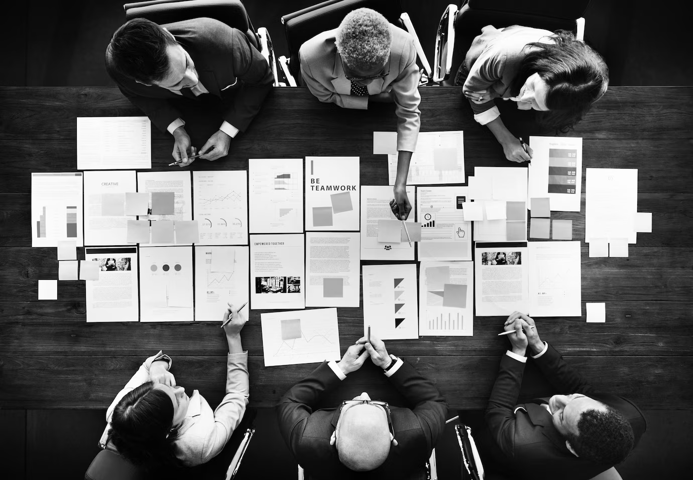 TechUp engineer monitoring application performance on laptop